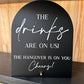 The Drinks Are On Us Sign
